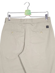 Pantaloni BOSS Hugo Boss bej deschis mărime S detaliu material și croială second-hand premium
