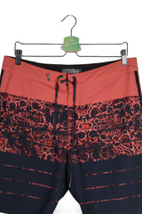 Pantaloni scurti O'Neill coral și bleumarin mărime S detaliu material și croială second-hand premium