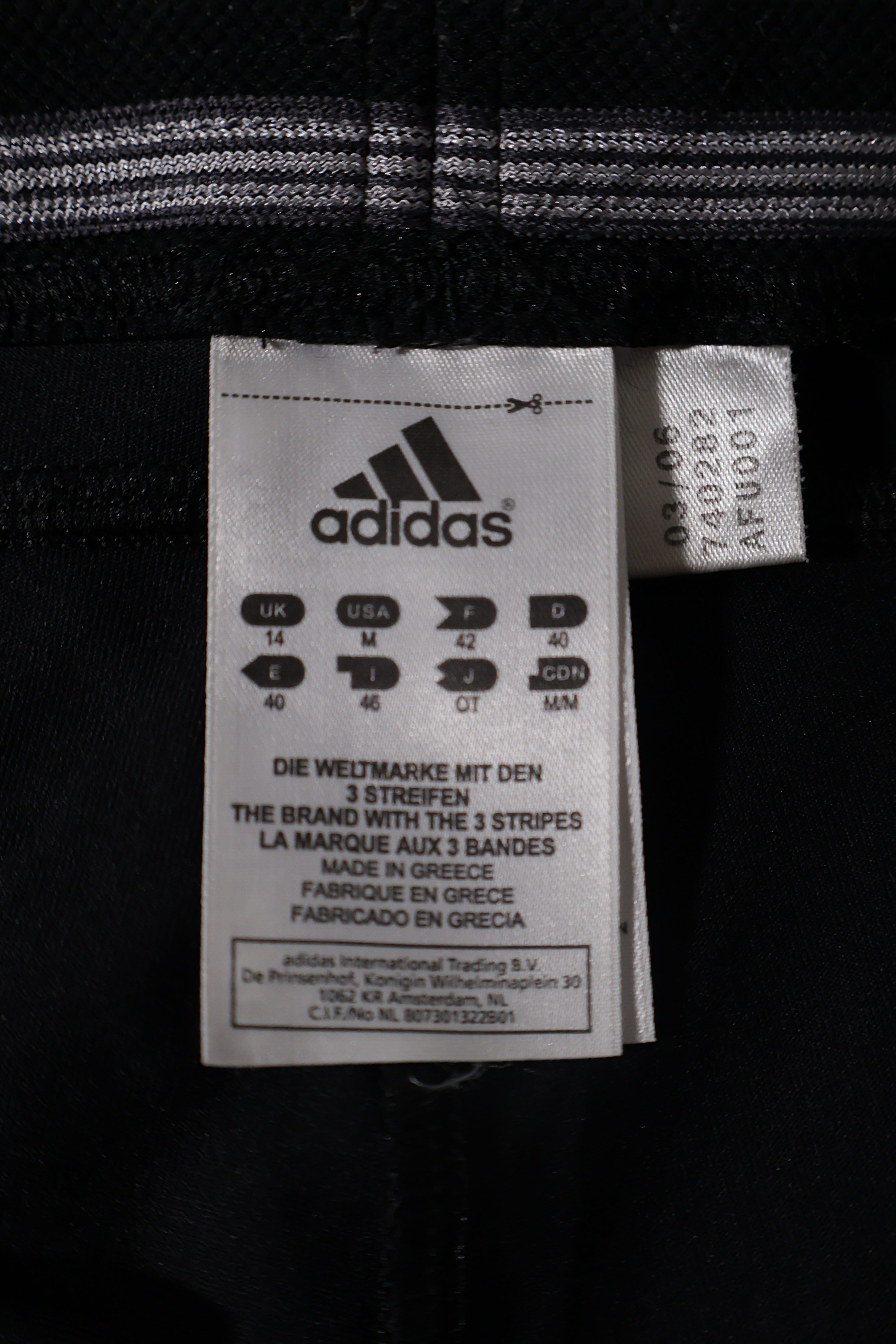 Eticheta marime si compozitie (rotita dreapta) - Colanti scurti - adidas capri negru din material elastic – M – Femei