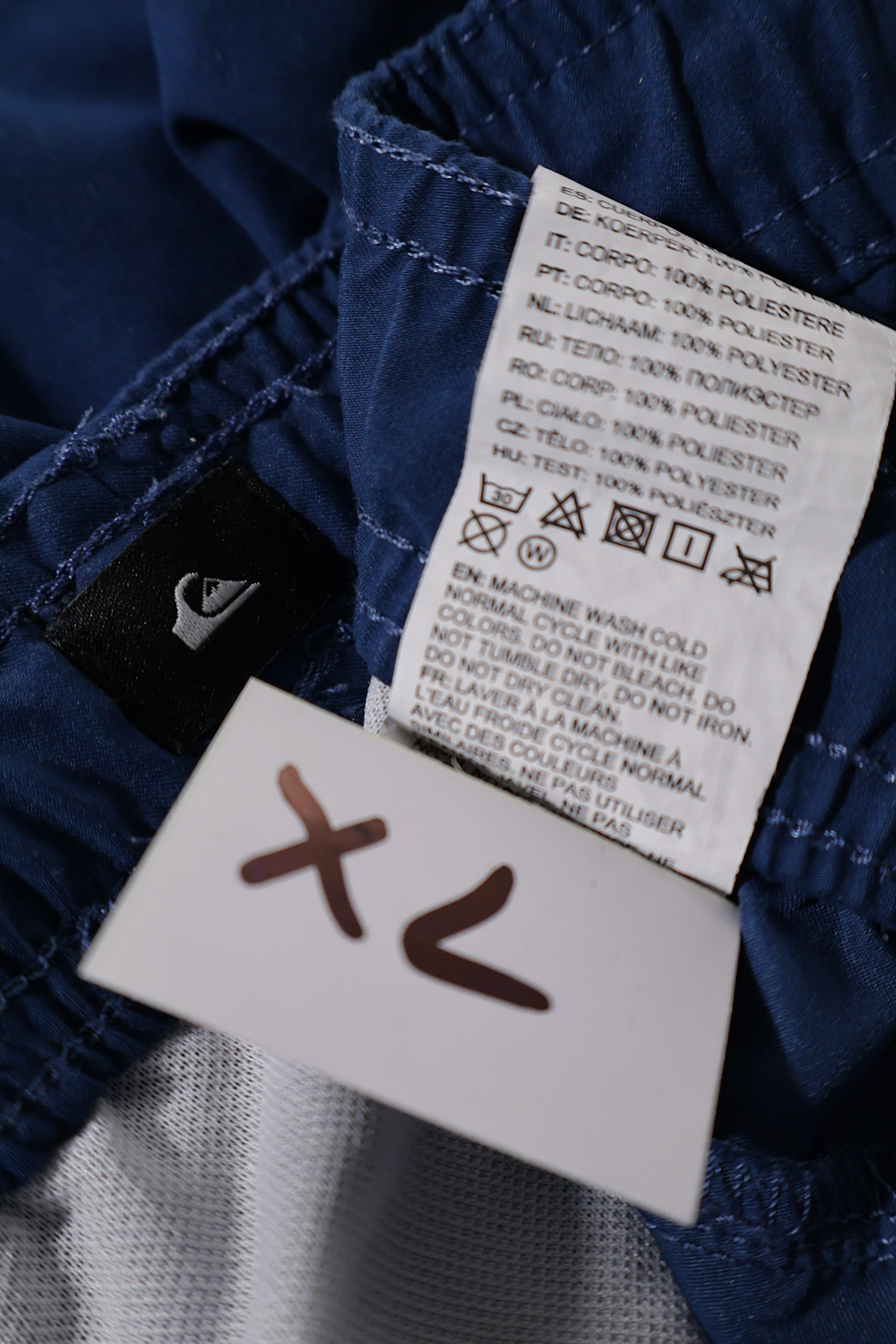 Eticheta marime si compozitie (rotita dreapta) - Pantaloni scurți - Quiksilver boardshorts albastre din poliester – XL – Bărbați