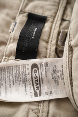 Eticheta marime si compozitie (rotita dreapta) - Pantaloni - G-STAR bej din bumbac cu croială dreaptă și buzunare utilitare – M – Bărbați
