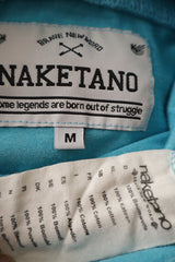 Tricou Naketano turcoaz deschis mărime M etichetă mărime și compoziție second-hand premium