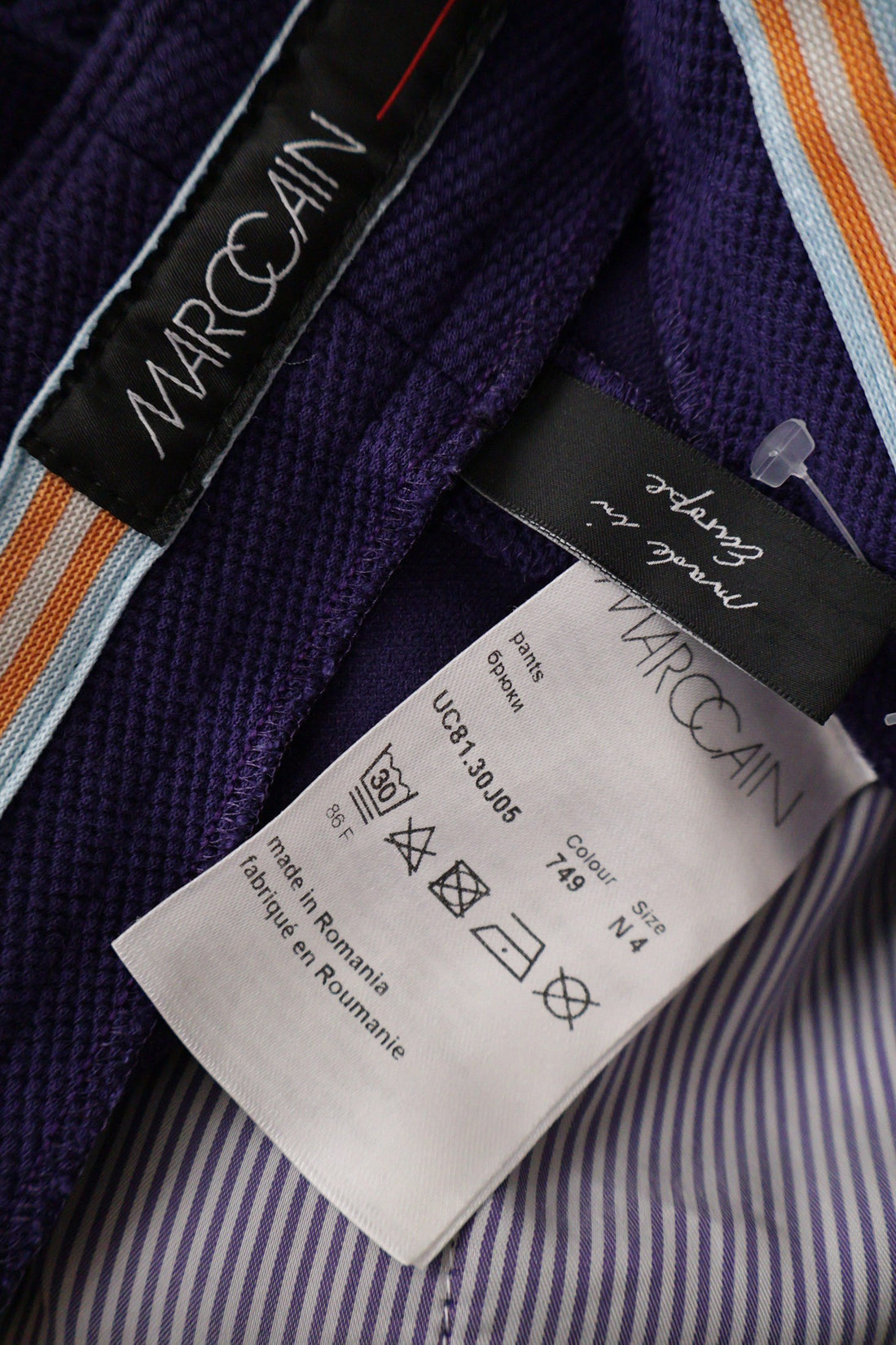 Pantaloni Marc O'Polo mov mărime L etichetă mărime și compoziție second-hand premium