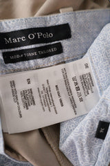 Pantaloni Marc O'Polo bej mărime S etichetă mărime și compoziție second-hand premium