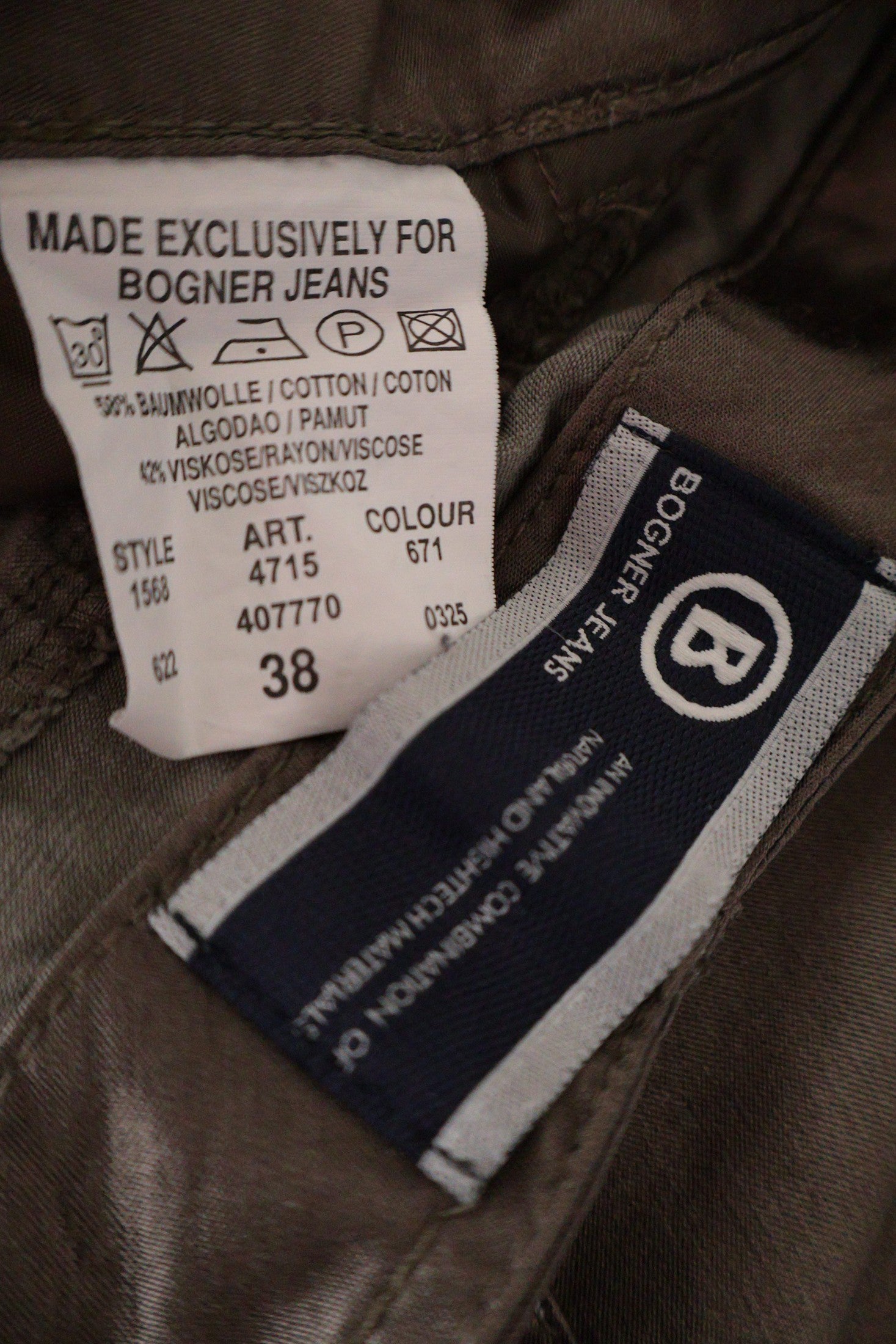 Pantaloni Bogner Jeans gri-olive metalizat mărime M etichetă mărime și compoziție second-hand premium