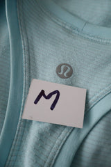 Top Lululemon albastru deschis mărime M etichetă mărime și compoziție second-hand premium