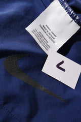 Pantaloni scurti Nike albastru mărime L etichetă mărime și compoziție second-hand premium