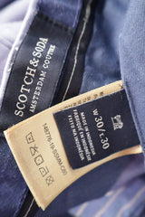 Pantaloni Scotch & Soda bleu deschis mărime S etichetă mărime și compoziție second-hand premium