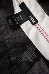 Pantaloni H&M gri mărime L etichetă mărime și compoziție second-hand premium