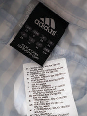 Eticheta marime si compozitie (rotita dreapta) - Cămașă adidas carouri bleu pastel – S – Femei