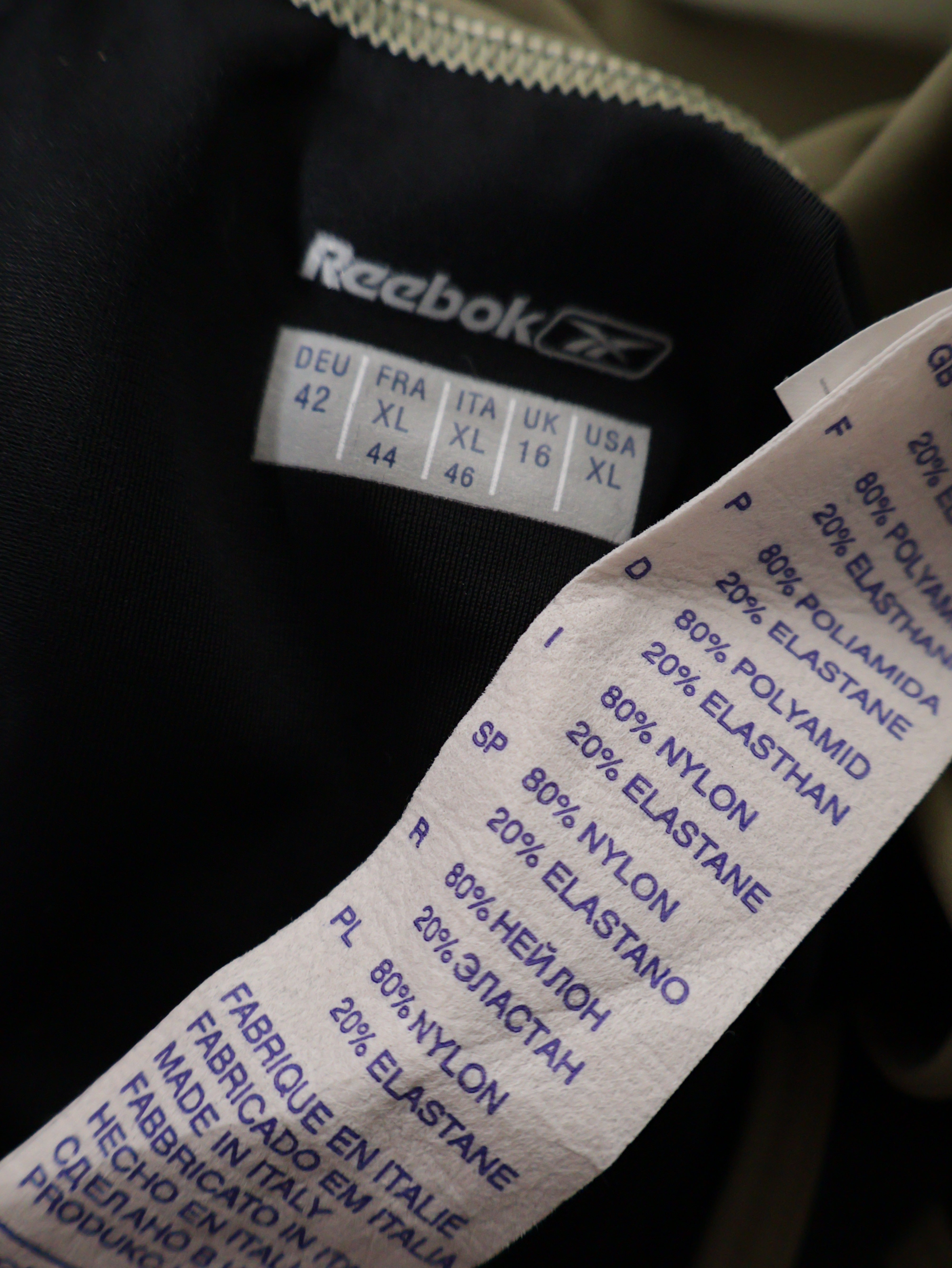 Eticheta marime si compozitie (rotita dreapta) - Maiou Reebok bicolor cu margini contrastante – XL – Femei
