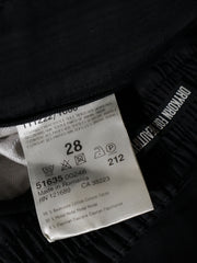 Eticheta marime si compozitie (rotita dreapta) - Pantaloni Drykorn negru cu finisaj neted – XS – Femei