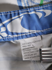 Eticheta marime si compozitie (rotita dreapta) - Pantaloni O'Neill alb cu imprimeu tartan – M – Femei