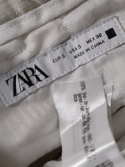 Eticheta marime si compozitie (rotita dreapta) - Pantaloni Zara din in crem cu croială dreaptă – S – Bărbați