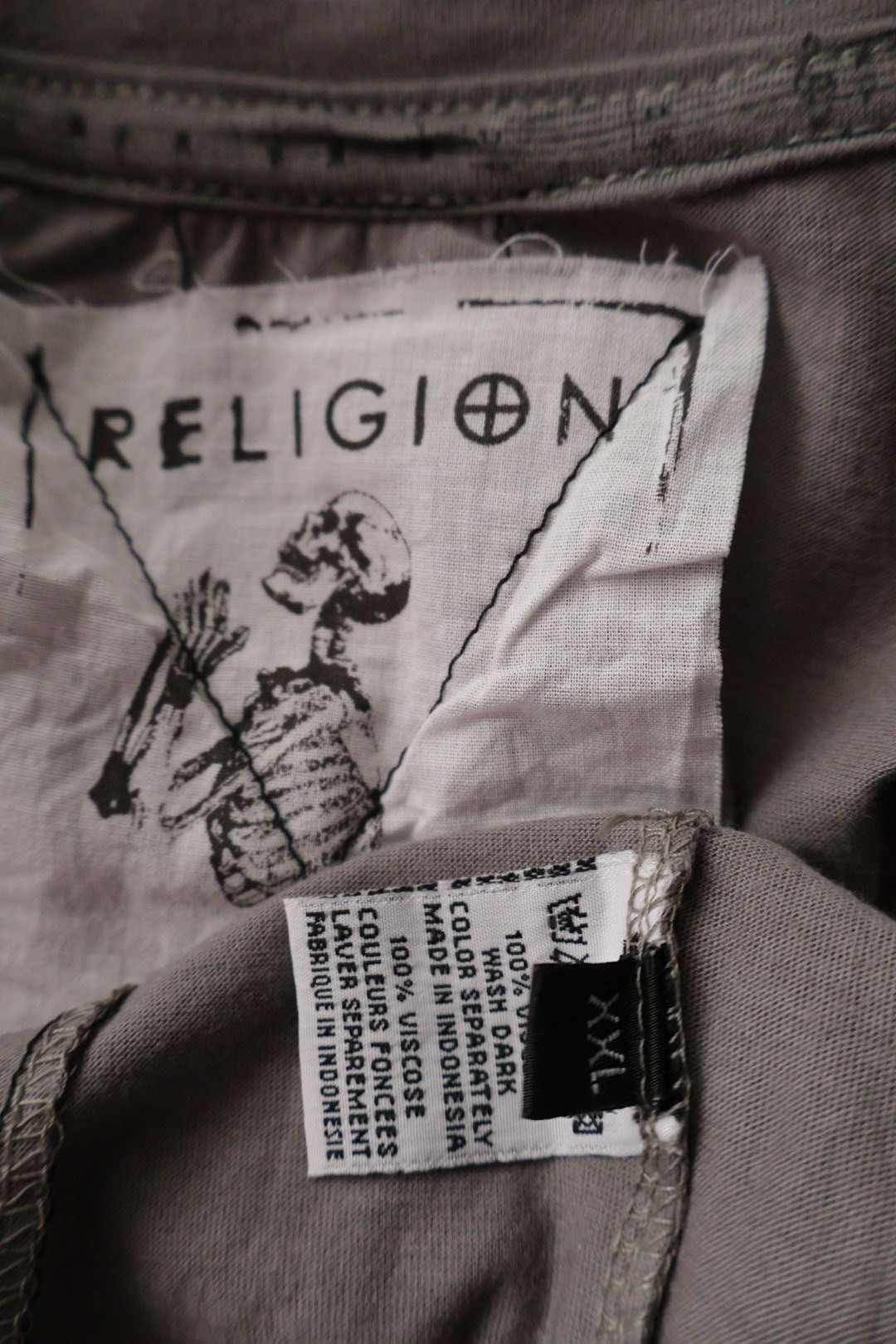 RELIGI⊕N – bluză – etichetă – second-hand premium