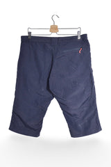 Pantaloni 2/3 - McKINLEY bleumarin din nylon cu buzunar lateral cu fermoar – XL – Femei - spate