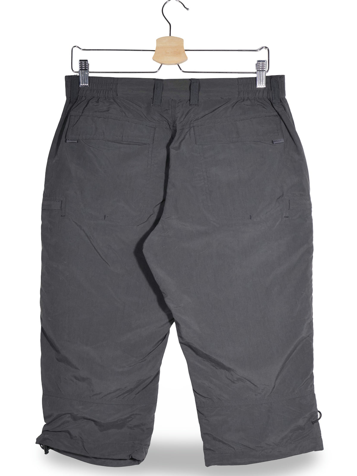 Pantaloni 2/3 Vaude gri inchis mărime XS vedere din spate second-hand premium