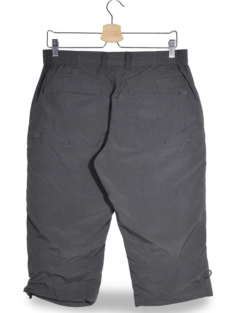 Pantaloni 2/3 Vaude gri inchis mărime XS vedere din spate second-hand premium