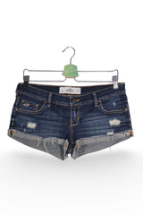Blugi scurți - Hollister albaștri închiși din denim prespălat cu detalii destroyed – S – Femei - fata