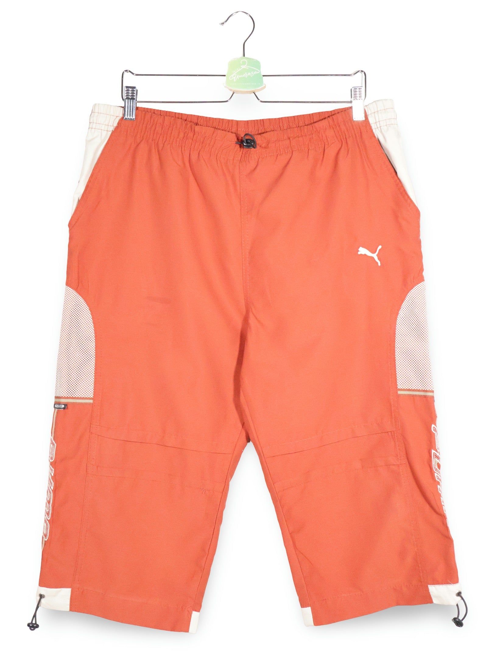 Pantaloni 2/3 PUMA portocaliu mărime XL vedere din față second-hand premium
