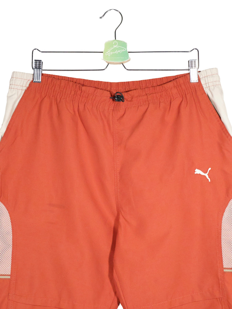 Pantaloni 2/3 PUMA portocaliu mărime XL detaliu material și croială second-hand premium