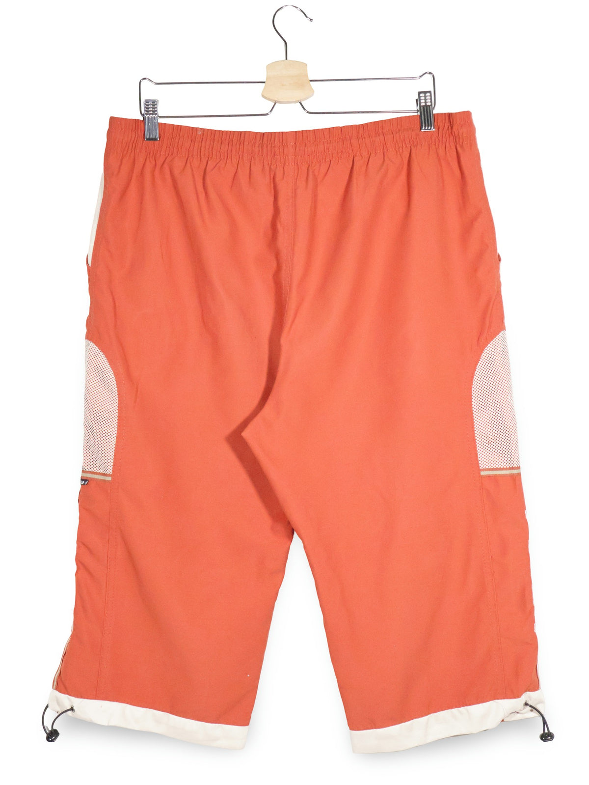 Pantaloni 2/3 PUMA portocaliu mărime XL vedere din spate second-hand premium