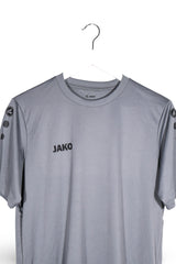 Tricou JAKO gri mărime S detaliu material și croială second-hand premium