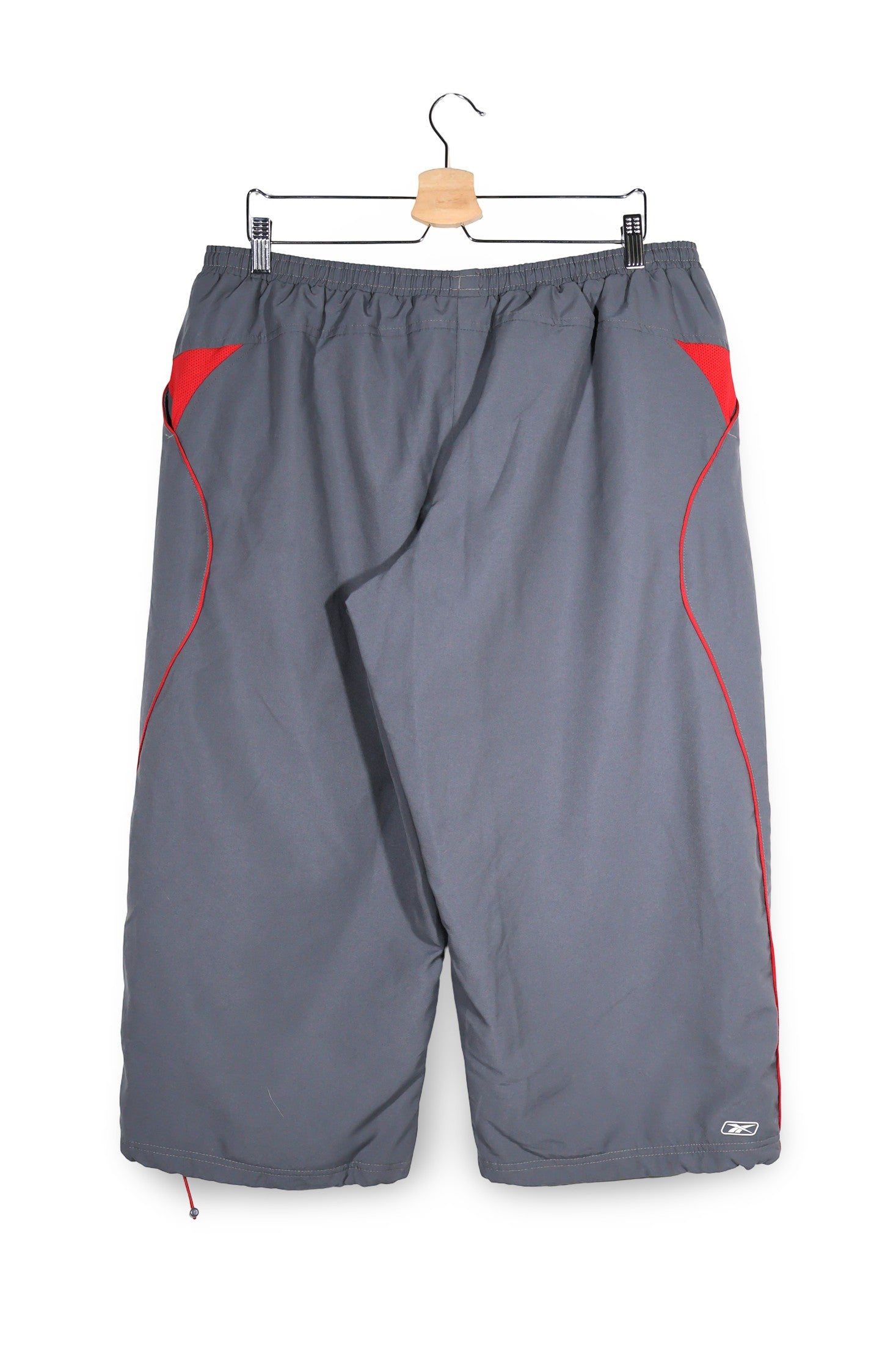 Pantaloni 2/3 Reebok gri mărime 3XL vedere din spate second-hand premium