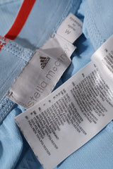 Eticheta marime si compozitie (rotita dreapta) - Pantaloni scurți - adidas albastru deschis sport din poliester – M – Femei