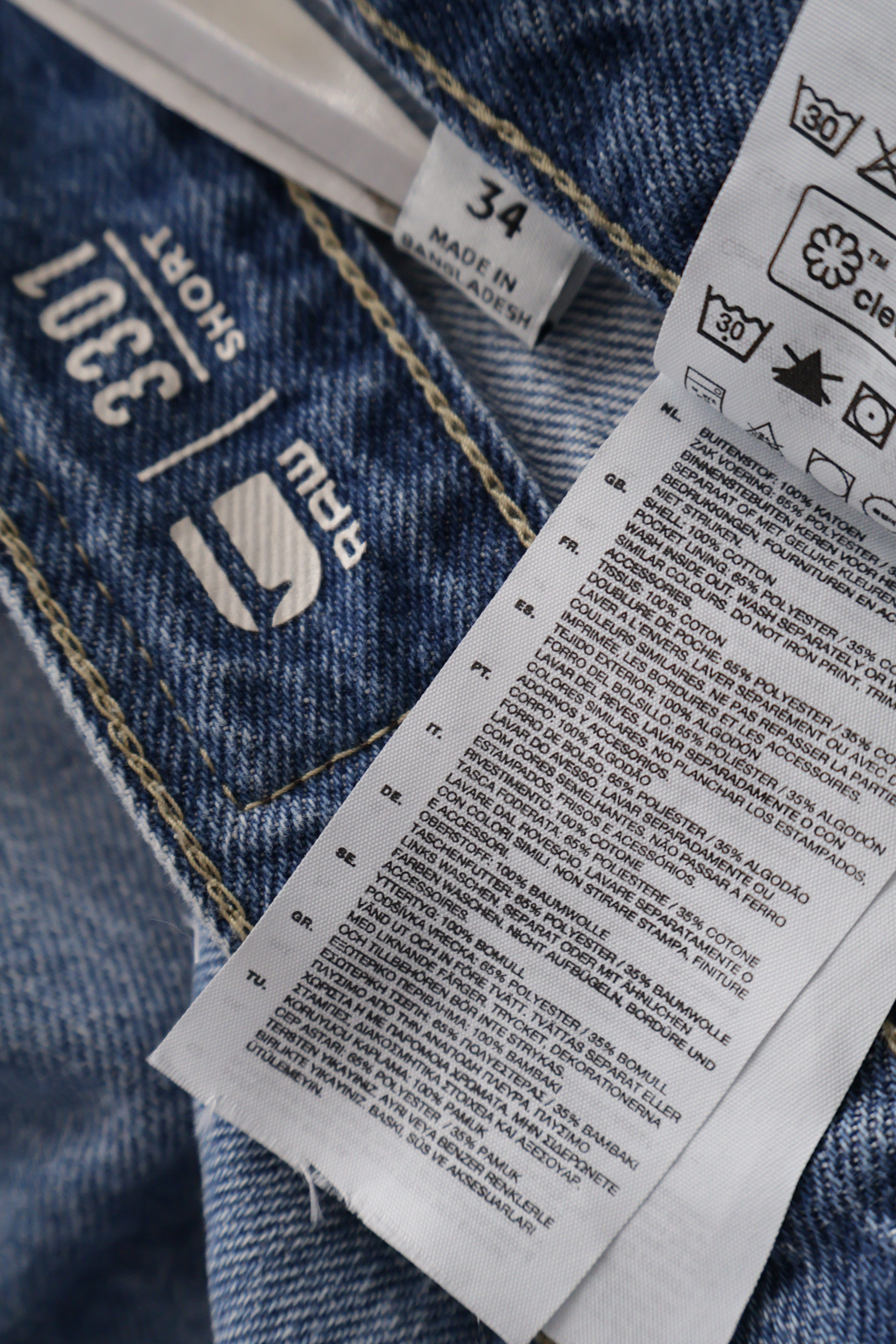 Eticheta marime si compozitie (rotita dreapta) - Blugi scurți - G-star denim albastru decolorat, cu revere – M – Bărbați