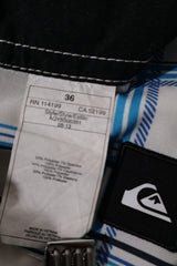 Eticheta marime si compozitie (rotita dreapta) - Pantaloni scurți - Quiksilver boardshorts albastre cu carouri – L – Bărbați