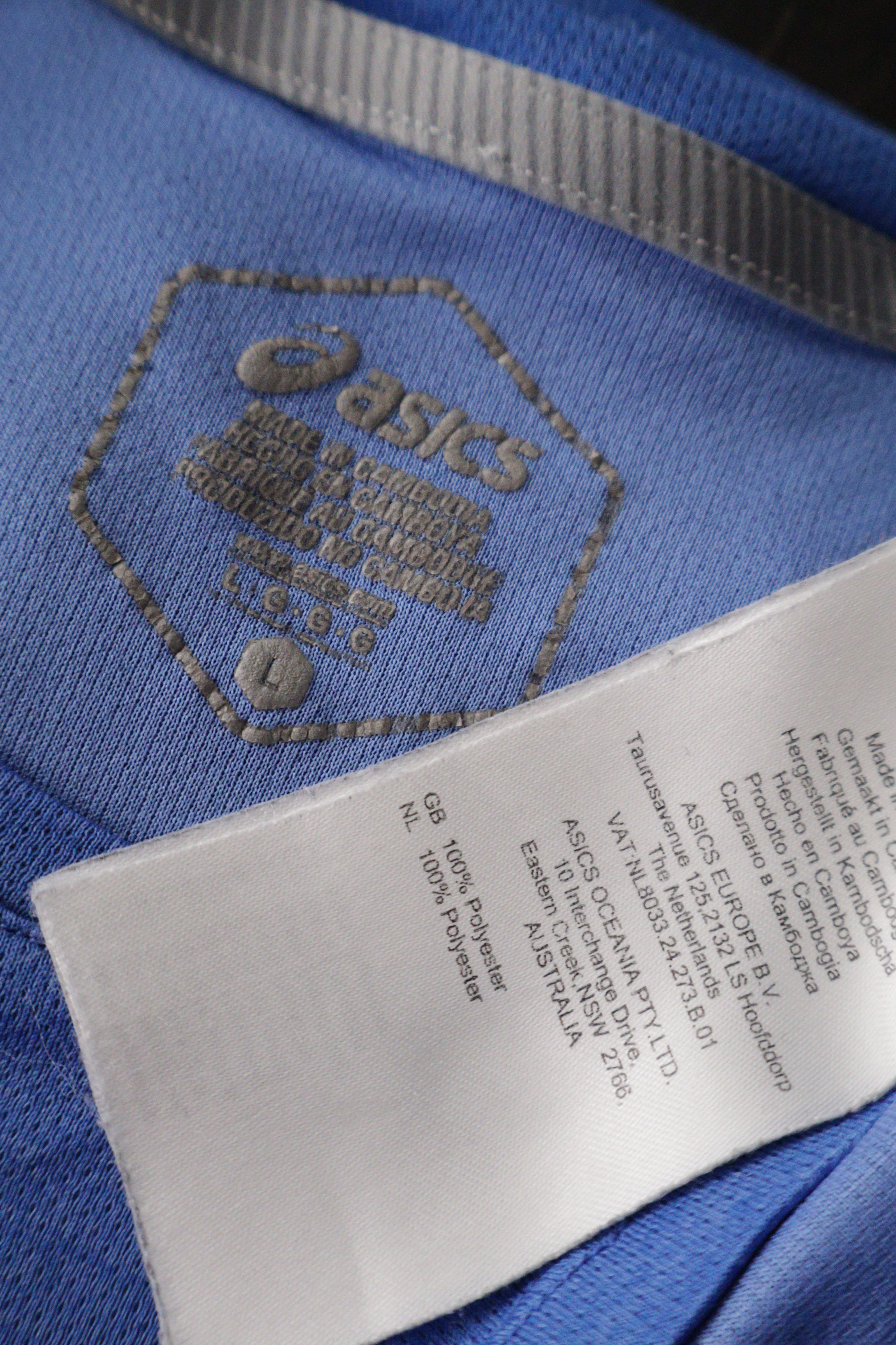 Eticheta marime si compozitie (rotita dreapta) - Tricou - ASICS albastru din poliester cu detalii reflective – L – Femei
