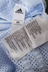 Eticheta marime si compozitie (rotita dreapta) - Maiou - Adidas albastru deschis cu panouri ventilate – XS – Femei