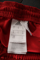 Eticheta marime si compozitie (rotita dreapta) - Pantaloni scurți - Adidas roșii din material sport cu talie elastică – M – Femei