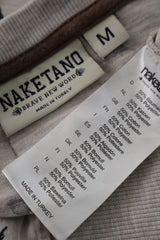 Tricou Naketano bej deschis mărime M etichetă mărime și compoziție second-hand premium