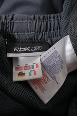 Pantaloni 2/3 Reebok gri mărime 3XL etichetă mărime și compoziție second-hand premium