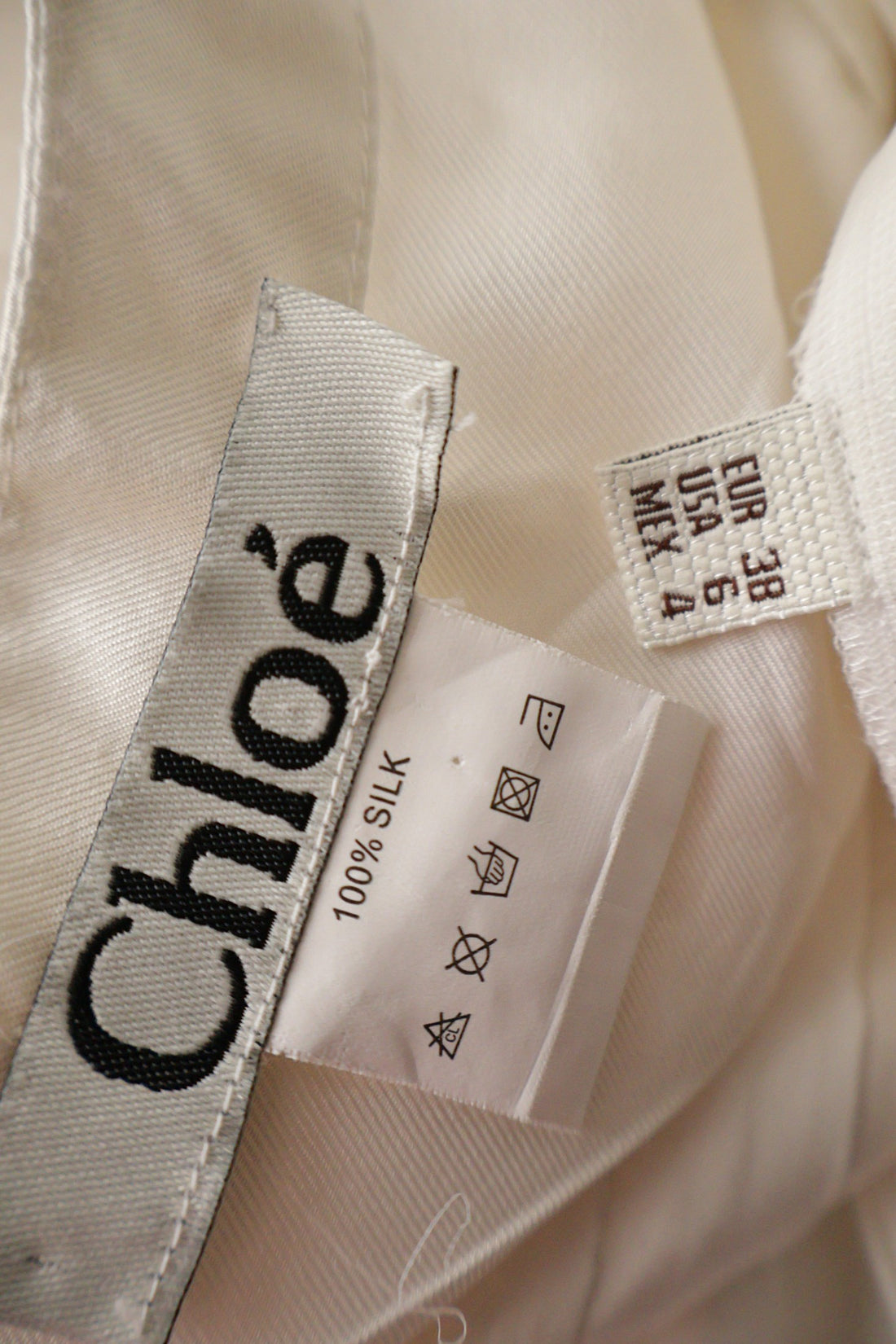 Top Chloé alb ivoire mărime M etichetă mărime și compoziție second-hand premium