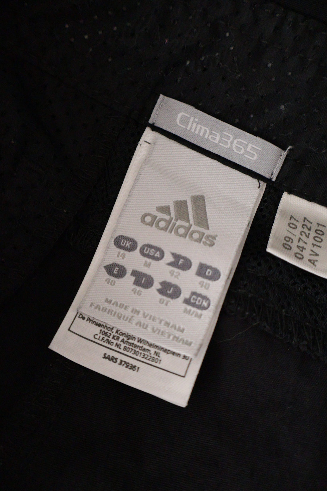 Pantaloni 2/3 adidas negru mărime M etichetă mărime și compoziție second-hand premium