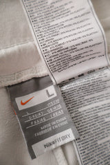 Pantaloni 2/3 NIKE alb mărime L etichetă mărime și compoziție second-hand premium