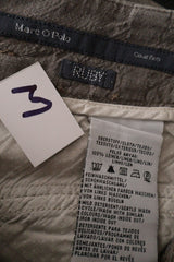 Pantaloni Marc O'Polo bej-gri mărime M etichetă mărime și compoziție second-hand premium