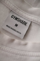 Tricou GYMSHARK alb mărime M etichetă mărime și compoziție second-hand premium
