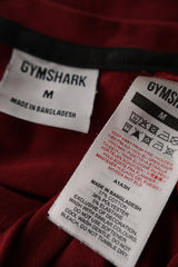 Tricou Gymshark roșu mărime M etichetă mărime și compoziție second-hand premium