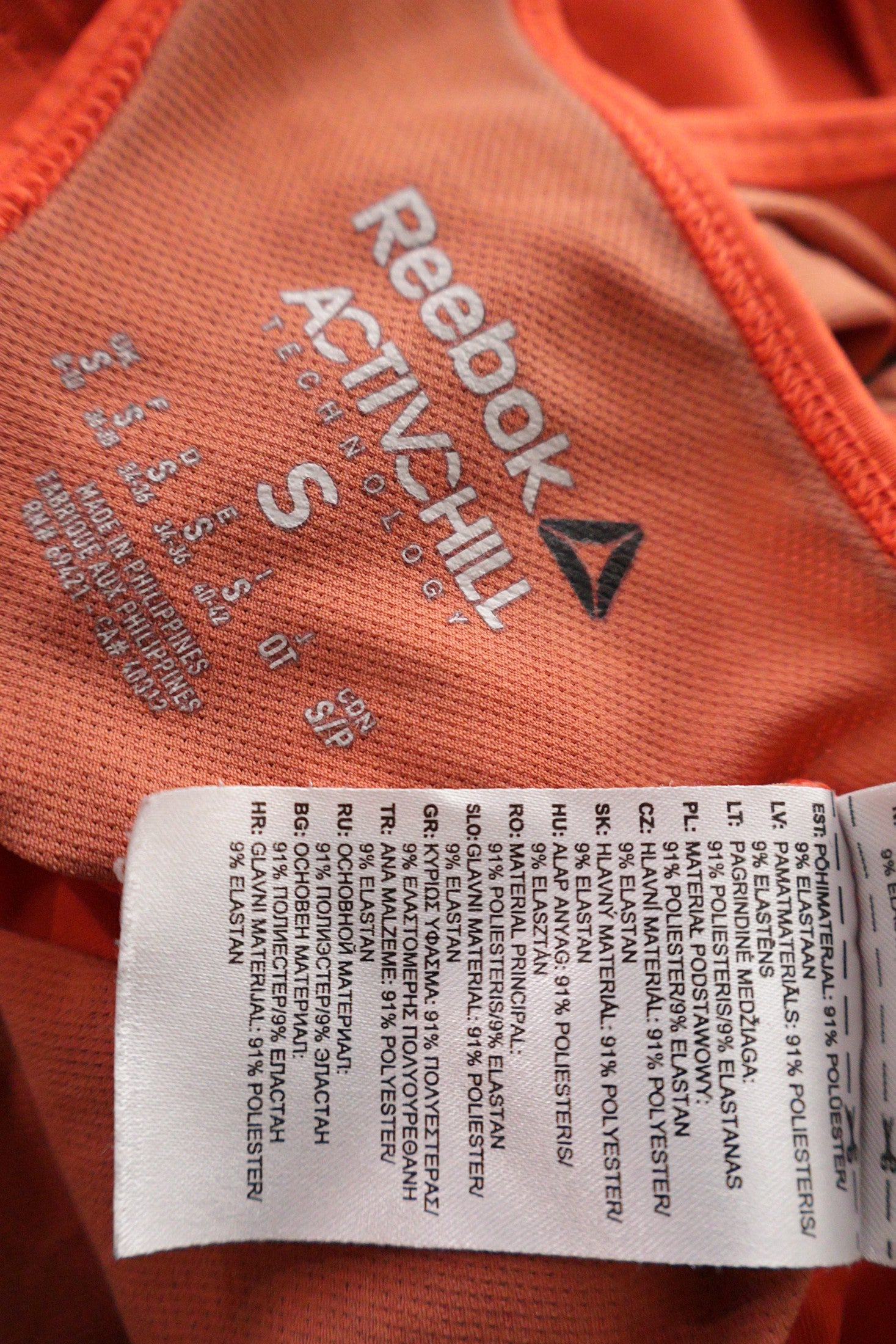 Maiou Reebok portocaliu mărime S etichetă mărime și compoziție second-hand premium