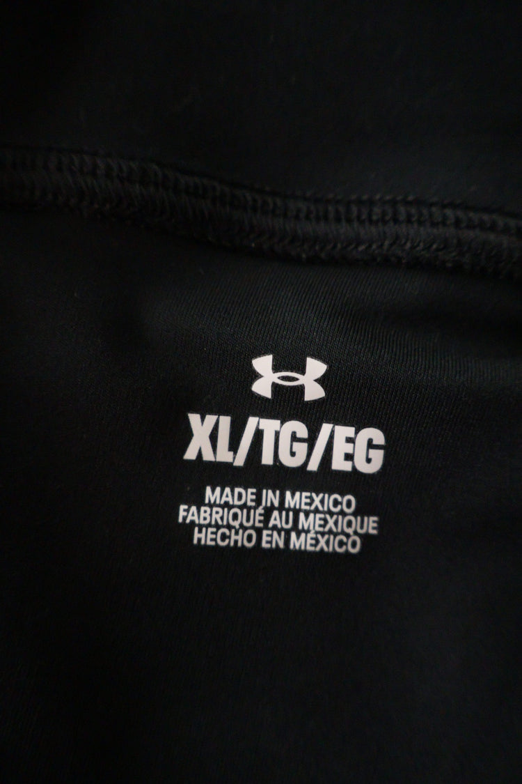 Fusta Under Armour negru mărime XL etichetă mărime și compoziție second-hand premium