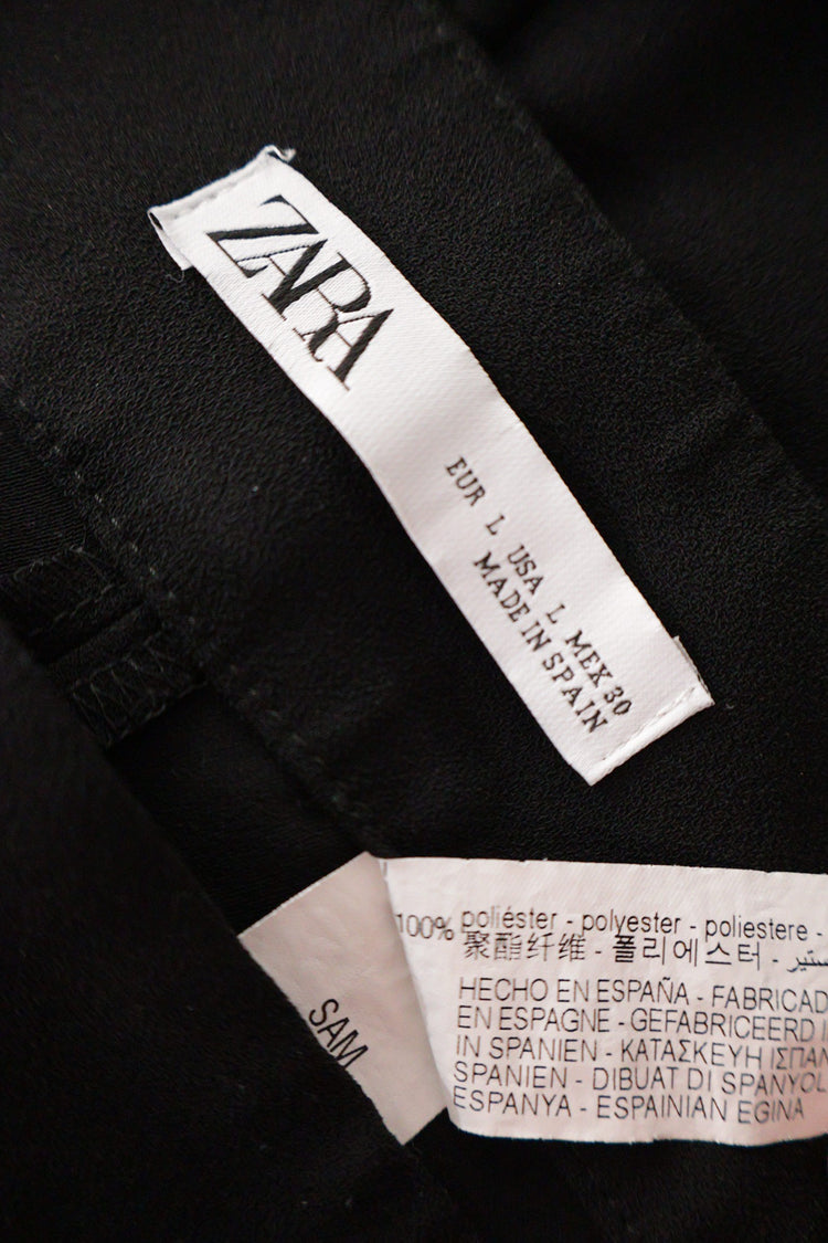 Pantaloni ZARA negru mărime L etichetă mărime și compoziție second-hand premium