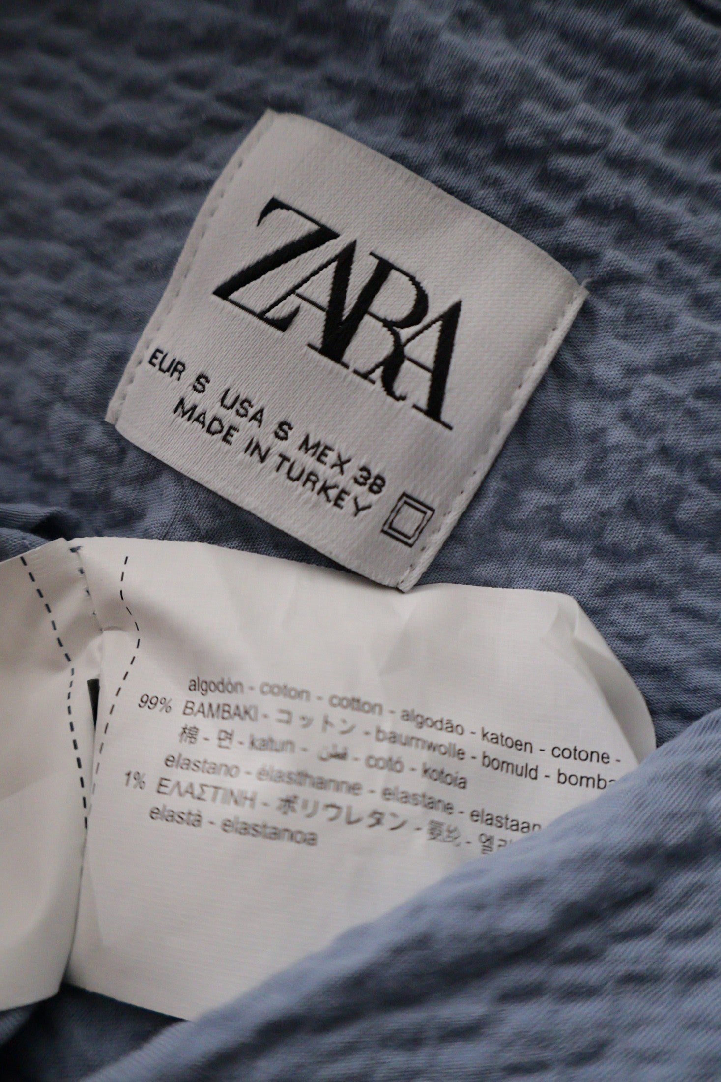 Camasa ZARA albastru deschis mărime S etichetă mărime și compoziție second-hand premium