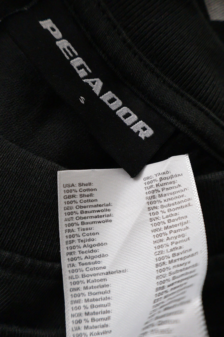 Tricou PEGADOR negru mărime S etichetă mărime și compoziție second-hand premium