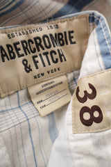 Pantaloni scurti Abercrombie & Fitch alb cu dungi albastre mărime XL etichetă mărime și compoziție second-hand premium