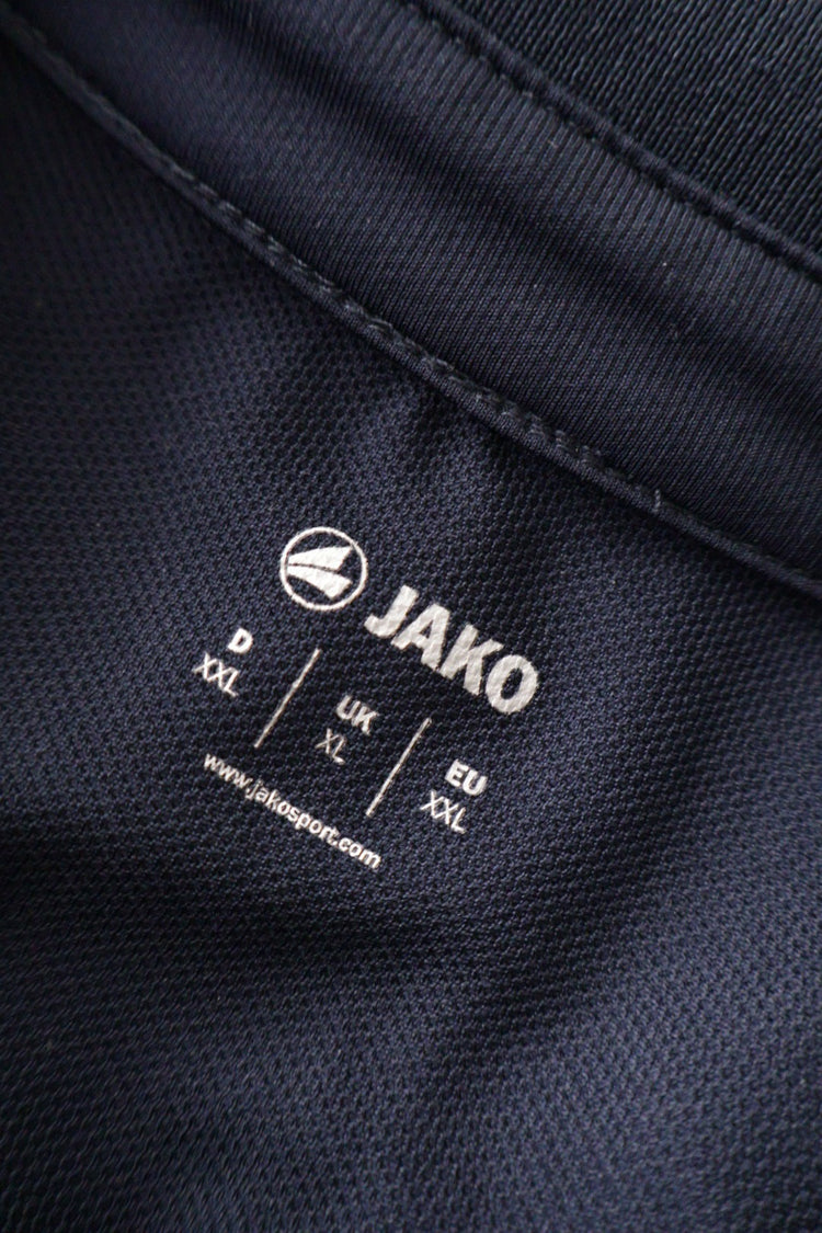 Tricou Jako bleumarin cu albastru mărime XL etichetă mărime și compoziție second-hand premium