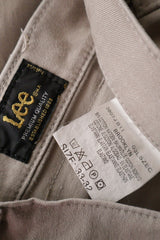 Blugi Lee bej deschis mărime W33 etichetă mărime și compoziție second-hand premium